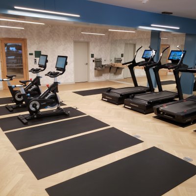 view of bike and treadmills